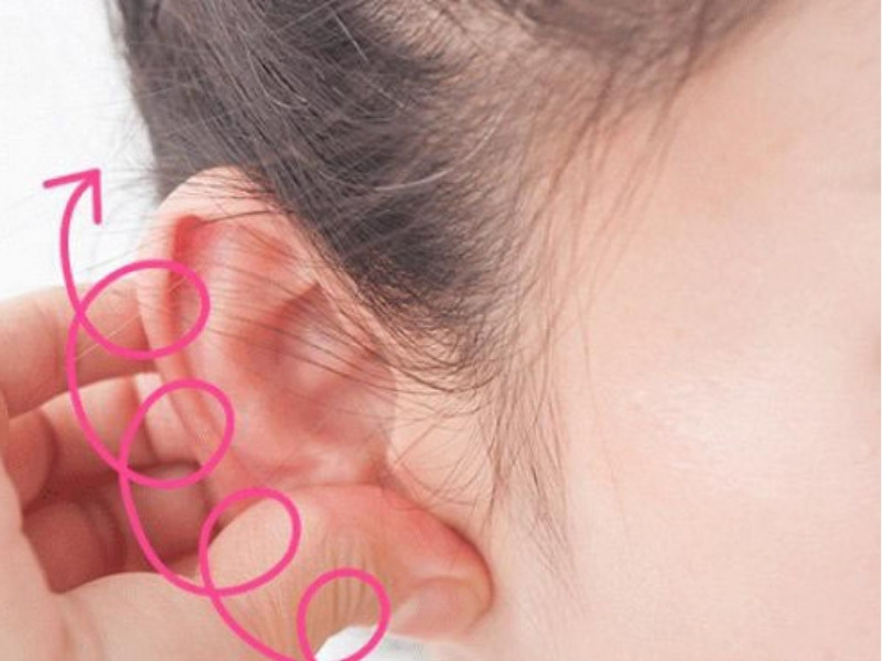 Massage vùng giữa tai và dái tai