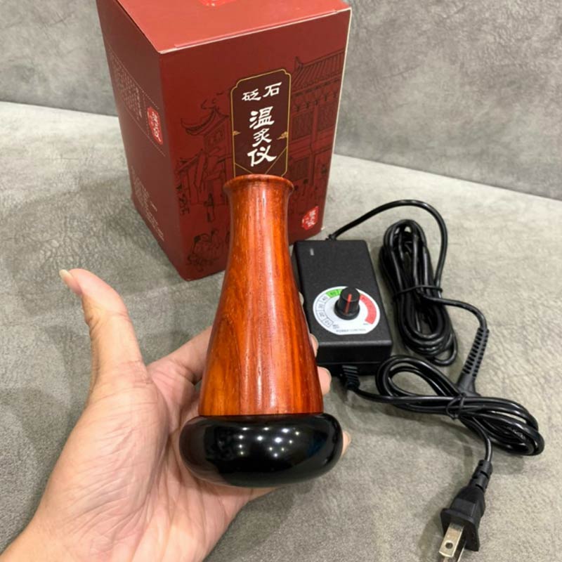 Máy massage đá nóng đả thông kinh lạc